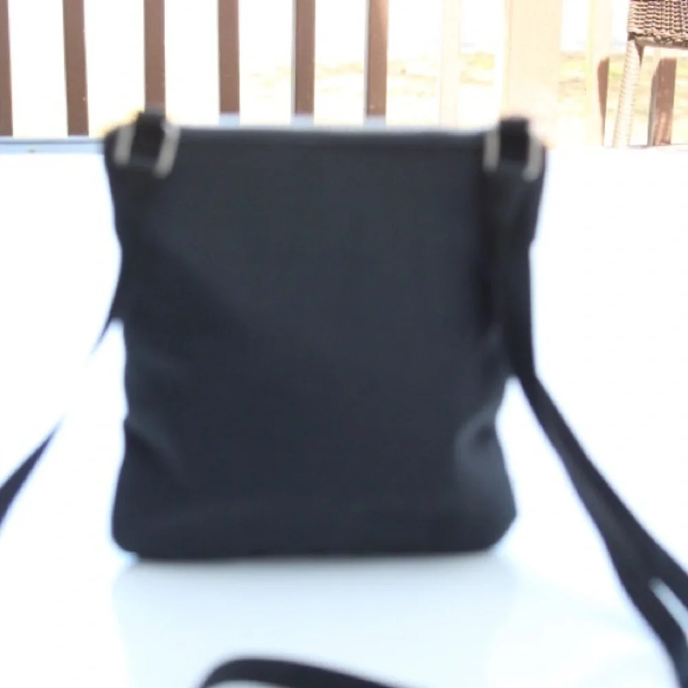 Baggallini triple zip cross body bag